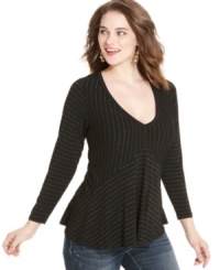 Score some the season's hottest trends with American's Rag's striped plus size top, punctuated by a peplum waist. Score some the season's hottest trends with American's Rag's striped plus size top, punctuated by a peplum waist.