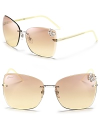 As beautiful as a butterfly, these oversized rimless sunglasses are sure to turn heads. As beautiful as a butterfly, these oversized rimless sunglasses are sure to turn heads.