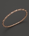 From the Bamboo Collection, a sleek bangle in 18k pink gold. By Gucci.