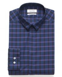 Checkers paired with bold color make this no-nonsense, slim-fit, no-iron dress shirt from Calvin Klein a natural go-to for the weekend or work. Checkers paired with bold color make this no-nonsense, slim-fit, no-iron dress shirt from Calvin Klein a natural go-to for the weekend or work.