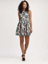 Strikingly feminine silhouette in an abstract floral print with a gathered waistband, flared skirt and soft silk finish. RoundneckSleevelessGathered waistbandFlared skirtSide zipperAbout 18 from natural waist50% cotton/50% silkDry cleanMade in USA of imported fabricModel shown is 5'10 (177cm) wearing US size Small. Strikingly feminine silhouette in an abstract floral print with a gathered waistband, flared skirt and soft silk finish. RoundneckSleevelessGathered waistbandFlared skirtSide zipperAbout 18 from natural waist50% cotton/50% silkDry cleanMade in USA of imported fabricModel shown is 5'10 (177cm) wearing US size Small.