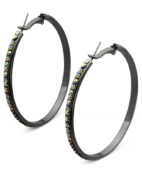 Luminous details take charge on these clutchless hoops from GUESS. Clear, amethyst and light amethyst crystal stones adorn a classic earring silhouette. Crafted in hematite tone mixed metal. Approximate drop: 2-1/4 inches. Luminous details take charge on these clutchless hoops from GUESS. Clear, amethyst and light amethyst crystal stones adorn a classic earring silhouette. Crafted in hematite tone mixed metal. Approximate drop: 2-1/4 inches.