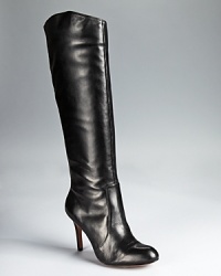 Corso Como's timeless Darling boots feel classically feminine-these tall black boots earn their spot in your shoe wardrobe in soft leather and a knee-high silhouette. Corso Como's timeless Darling boots feel classically feminine-these tall black boots earn their spot in your shoe wardrobe in soft leather and a knee-high silhouette.