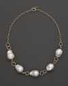 Boldly gleaming baroque freshwater pearls add rich luster to 14K yellow gold. By Nancy B.