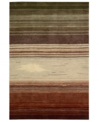 Variegated stripes of earthy tones into warm reds creates a design as artistically moving as it is functional. Hand tufted of long polyester fibers for added strength and softness, the Contour area rug from Nourison creates an ideal accent for any modern room. (Clearance) Variegated stripes of earthy tones into warm reds creates a design as artistically moving as it is functional. Hand tufted of long polyester fibers for added strength and softness, the Contour area rug from Nourison creates an ideal accent for any modern room. (Clearance)