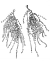 Light up your night with these sparklers. GUESS's dazzling drop earrings feature a multi-chain and rhinestone design that make for extra illumination. Set in silver tone mixed metal. Approximate drop: 4-1/2 inches. Light up your night with these sparklers. GUESS's dazzling drop earrings feature a multi-chain and rhinestone design that make for extra illumination. Set in silver tone mixed metal. Approximate drop: 4-1/2 inches.