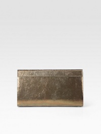This hand-held design features beautifully shiny lame leather.Hinged magnetic closureOne inside open pocketSatin lining9W X 5H X 2DMade in Italy This hand-held design features beautifully shiny lame leather.Hinged magnetic closureOne inside open pocketSatin lining9W X 5H X 2DMade in Italy