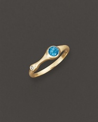 A faceted blue topaz and a brilliant diamond add bright color to gleaming 18K yellow gold. By Carelle. A faceted blue topaz and a brilliant diamond add bright color to gleaming 18K yellow gold. By Carelle.