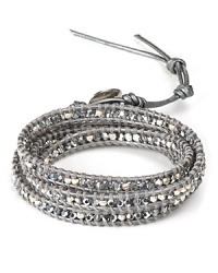 Take your wrist in a bohemian direction with Chan Luu's textured wrap bracelet. Boasting an eclectic mix of crystal stones, this leather piece is perfect for layering. Take your wrist in a bohemian direction with Chan Luu's textured wrap bracelet. Boasting an eclectic mix of crystal stones, this leather piece is perfect for layering.