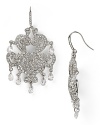 These Carolee chandelier earrings are an ornate focal point for your look, accented by crystal stones and cast in silver plate.