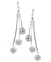 Airy and elegant, this pair of linear chandelier earrings from Anne Klein is crafted from silver-tone mixed metal. Glass crystal accents add a lustrous touch. Approximate drop 1-1/2 inches. Airy and elegant, this pair of linear chandelier earrings from Anne Klein is crafted from silver-tone mixed metal. Glass crystal accents add a lustrous touch. Approximate drop 1-1/2 inches.