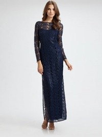 A timeless silhouette finished with allover lace and shimmering embellishments.BoatneckBracelet sleevesConcealed back zip closureSide slitAbout 61 from shoulder to hemFully lined75% metallic/25% polyesterDry cleanImportedModel shown is 5'10 (177cm) wearing US size 4. A timeless silhouette finished with allover lace and shimmering embellishments.BoatneckBracelet sleevesConcealed back zip closureSide slitAbout 61 from shoulder to hemFully lined75% metallic/25% polyesterDry cleanImportedModel shown is 5'10 (177cm) wearing US size 4.