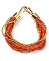 Do the bright thing: Let MICHAEL Michael Kors lend every look a colorful touch with this layered strand of coral beads, accented by a gold plated snake chain bracelet.