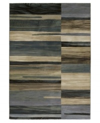 Brilliant tones of bone, tan, silver, teal and sage scatter across this Taylor Synchrony area rug from Couristan, creating the ultimate floor accent for complementing industrial and mid-century decors. Wilton-woven for unparalleled depth, texture and quality. Brilliant tones of bone, tan, silver, teal and sage scatter across this Taylor Synchrony area rug from Couristan, creating the ultimate floor accent for complementing industrial and mid-century decors. Wilton-woven for unparalleled depth, texture and quality.