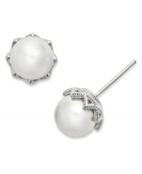 Polished to perfection. These stunning studs from Eliot Danori highlight simulation pearls (8 mm) with a crystal core and genuine mother-of-pearl coating. Surrounded by a crystal-accented design. Set in rhodium-plated silver tone mixed metal. Approximate diameter: 1/4 inch. Polished to perfection. These stunning studs from Eliot Danori highlight simulation pearls (8 mm) with a crystal core and genuine mother-of-pearl coating. Surrounded by a crystal-accented design. Set in rhodium-plated silver tone mixed metal. Approximate diameter: 1/4 inch.