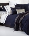 This Windsor Navy decorative pillow from Hugo Boss is the perfect finishing touch for your bedding ensemble. Its silky smooth texture adds a layer of sophistication. Zipper closure.