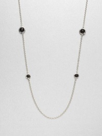 Faceted black onyx stones set in sleek sterling silver on a long link chain. Black onyxSterling silverLength, about 38Lobster clasp closureImported Faceted black onyx stones set in sleek sterling silver on a long link chain. Black onyxSterling silverLength, about 38Lobster clasp closureImported