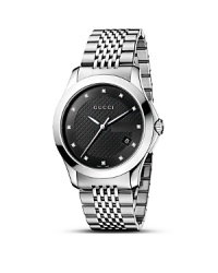 A stainless steel watch from the Gucci G-Timeless collection. Round black pattern dial set with 12 diamonds. Sweep second hand and date window. A stainless steel watch from the Gucci G-Timeless collection. Round black pattern dial set with 12 diamonds. Sweep second hand and date window.