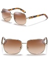 Classic oversized sunglasses with tortoise contrast arms for a stylish accent.