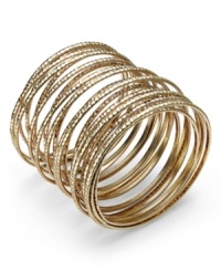 Layer up all at once! Bar III's unique bracelet combines multiple rows of textured gold tone mixed metal into one fabulous style. Approximate diameter: 2-1/2 inches to 2-3/4 inches. Layer up all at once! Bar III's unique bracelet combines multiple rows of textured gold tone mixed metal into one fabulous style. Approximate diameter: 2-1/2 inches to 2-3/4 inches.