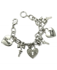Spread the love. This five-charm bracelet from GUESS is crafted from silver-tone mixed metal, with glass crystals and jet accents providing a stylish touch. Item comes packaged in a signature GUESS Gift Box. Approximate length: 7-1/2 inches. Approximate diameter: 1-1/2 inches. Approximate drop: 1 inch. Spread the love. This five-charm bracelet from GUESS is crafted from silver-tone mixed metal, with glass crystals and jet accents providing a stylish touch. Item comes packaged in a signature GUESS Gift Box. Approximate length: 7-1/2 inches. Approximate diameter: 1-1/2 inches. Approximate drop: 1 inch.