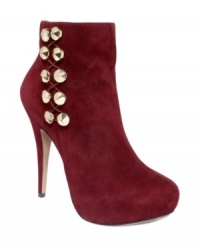 Hot to trot. Vince Camuto's Jardine platform booties feature a daring 4-1/2 heel, eye-catching button details and a sumptuous suede finish. Hot to trot. Vince Camuto's Jardine platform booties feature a daring 4-1/2 heel, eye-catching button details and a sumptuous suede finish.