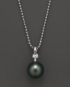 A timeless classic, this Tara Pearls necklace combines 18K white gold with a black Tahitian pearl, detailed with a sparkling diamond accent.