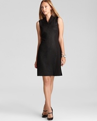 Exotics go executive as reptilian embellishment lends textural interest to a classic T Tahari sheath dress. Tame the style with classic pumps and sleek accents. Exotics go executive as reptilian embellishment lends textural interest to a classic T Tahari sheath dress. Tame the style with classic pumps and sleek accents.