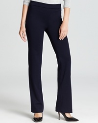 Rendered with a hint of stretch, these T Tahari pants glide over your curves for a fluid, flattering silhouette. Rendered with a hint of stretch, these T Tahari pants glide over your curves for a fluid, flattering silhouette.