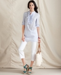 Ruffles, stripes and a relaxed tunic shape make for an essentially preppy look from Tommy Hilfiger. Pair it with white capris for a fresh on-trend look! Ruffles, stripes and a relaxed tunic shape make for an essentially preppy look from Tommy Hilfiger. Pair it with white capris for a fresh on-trend look!