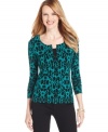 A pretty scrolling print awakens this basic cardigan from Top Knits! Pair it with skinny jeans for an on-trend look.