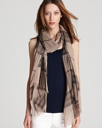 In Burberry's classic check, this oblong scarf offers lightweight luxe in a sheer, gauzy fabrication. In Burberry's classic check, this oblong scarf offers lightweight luxe in a sheer, gauzy fabrication.