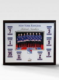 This gorgeous retired-numbers collage is a must have for any New York Rangers fan. This handsomely framed collage features a rare photograph of every Rangers legend, a replica of their retired-number banner and a piece of authentic game-used net. A must-have piece for any Rangers fan. Includes piece of game-used net and certificate of authenticity 35W X 30H Made in USA 