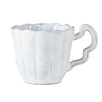 Handmade from Venetian terra marrone, or brown clay, this scalloped mug brings a rustically sophisticated note to your table. Handmade from Venetian terra marrone, or brown clay, this scalloped mug brings a rustically sophisticated note to your table.