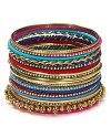 Nail this season's eclectic jewelry trend with beaded coil bracelet from Cara. Decorated with layers of multi colored beads, this colorful piece will work just as well for day as for night.