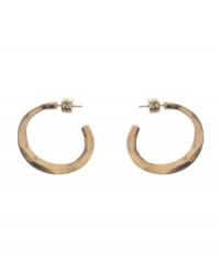Spruce up your look with essential accessories. 3/4 style hoops by Kenneth Cole New York feature a post setting in worn gold tone mixed metal. Approximate diameter: 1 inch. Spruce up your look with essential accessories. 3/4 style hoops by Kenneth Cole New York feature a post setting in worn gold tone mixed metal. Approximate diameter: 1 inch.