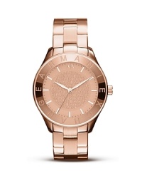Armani Exchange keeps your outlook rosy with this stylish, oversized timepiece that will keep you polished, workday and weekend. Armani Exchange keeps your outlook rosy with this stylish, oversized timepiece that will keep you polished, workday and weekend.
