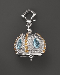 Inspired by Zen philosophy, this polished sterling silver Raja meditation bell from Paul Morelli is set with blue topaz and yellow citrine. Inspired by Zen philosophy, this polished sterling silver Raja meditation bell from Paul Morelli is set with blue topaz and yellow citrine.