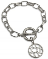 A must-have for subtle sophistication. T Tahari's charm bracelet from the Essentials collection features a circular pendant with an openwork design. Crafted in imitation rhodium mixed metal. Nickel-free for sensitive skin. Approximate length: 7-1/2 inches + 1-inch extender. A must-have for subtle sophistication. T Tahari's charm bracelet from the Essentials collection features a circular pendant with an openwork design. Crafted in imitation rhodium mixed metal. Nickel-free for sensitive skin. Approximate length: 7-1/2 inches + 1-inch extender.