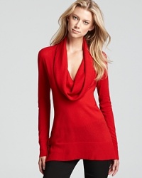 A plush Donna Karan New York cashmere sweater takes your layering collection to a soft new place with endless elegance thanks to a chic cowl neckline.