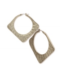 A throwback to classic 80s style combined with a modern spin. Hoop earrings by RACHEL Rachel Roy feature a textured surface crafted in worn gold tone mixed metal. Approximate diameter: 1 inch.