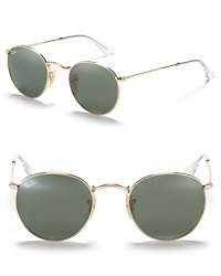 Ray-Ban's round metal frame sunglasses are a must-have this season. Ray-Ban's round metal frame sunglasses are a must-have this season.