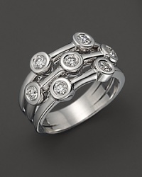 Seven sparkling diamonds, set in 18K. white gold, give the appearance of stacked rings. By Roberto Coin. Seven sparkling diamonds, set in 18K. white gold, give the appearance of stacked rings. By Roberto Coin.