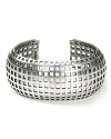 Giles & Brother's perforated silver cuff is hardcore fashion hardware. Don't reserve this accessory for after-hours--wear it to add a touch of tough to daytime favorites.