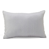 A glamorous decorative pillow, accented with rows of iridescent, pearl-like seed beads. A glamorous decorative pillow, accented with rows of iridescent, pearl-like seed beads.