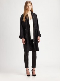 Sporty and versatile, this all-weather design is finished with a flattering drawstring waist and wide, cuffed sleeves.Jewel necklineSnap frontLong cuffed sleevesDrawstring waistbandFlap patch pocketsAbout 39 from shoulder to hemNylonDry cleanMade in USA of Italian fabricModel shown is 5'10 (177cm); one size fits all. Sporty and versatile, this all-weather design is finished with a flattering drawstring waist and wide, cuffed sleeves.Jewel necklineSnap frontLong cuffed sleevesDrawstring waistbandFlap patch pocketsAbout 39 from shoulder to hemNylonDry cleanMade in USA of Italian fabricModel shown is 5'10 (177cm); one size fits all.
