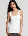 The basic white tank is a wardrobe essential. Layered, teamed or on its own, this top is a building block for statement style. James Perse's long-length iteration is a personal favorite with cropped cargos for spring. You can't have just one!