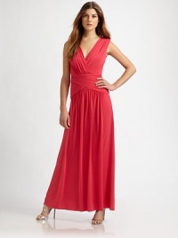 Soft, fluid jersey, in a floor-length style featuring a prettily cutout back.Surplice necklineSleevelessRuched waistbandGathered skirtBack cutout with hook-and-eye closuresConcealed back zipAbout 41¾ from natural waist73% acetate/20% nylon/7% spandexDry cleanImportedModel shown is 5'10 (177cm)wearing US size Small. Soft, fluid jersey, in a floor-length style featuring a prettily cutout back.Surplice necklineSleevelessRuched waistbandGathered skirtBack cutout with hook-and-eye closuresConcealed back zipAbout 41¾ from natural waist73% acetate/20% nylon/7% spandexDry cleanImportedModel shown is 5'10 (177cm)wearing US size Small.