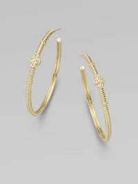 From the Jolie Collection. Elegantly fluted gold hoops, accented with gold beading and quatrefoil shapes set with sparkling diamonds.Diamonds, .12 tcw14k yellow goldDiameter, about 1½Post backImported