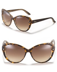 Look fierce in oversized cat eye sunglasses with gradient lenses and a spotted frame. Look fierce in oversized cat eye sunglasses with gradient lenses and a spotted frame.
